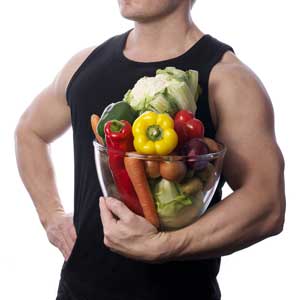 Sporters dragen fruit en groenten